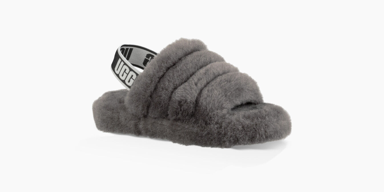 grey white and black ugg slides