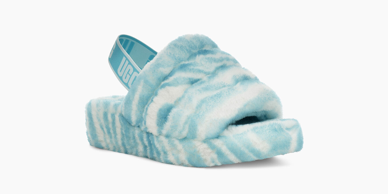 blue fluffy ugg slides