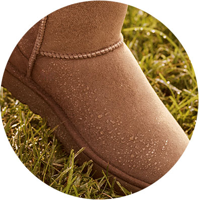 A classic two boot with droplets of water