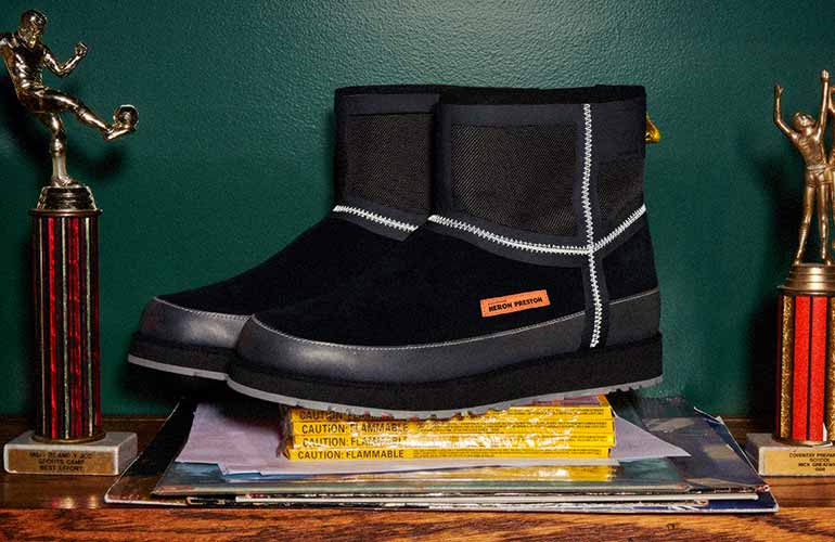Close-up of the UGG X HP Clsasic Short Zip Waterproof in black.