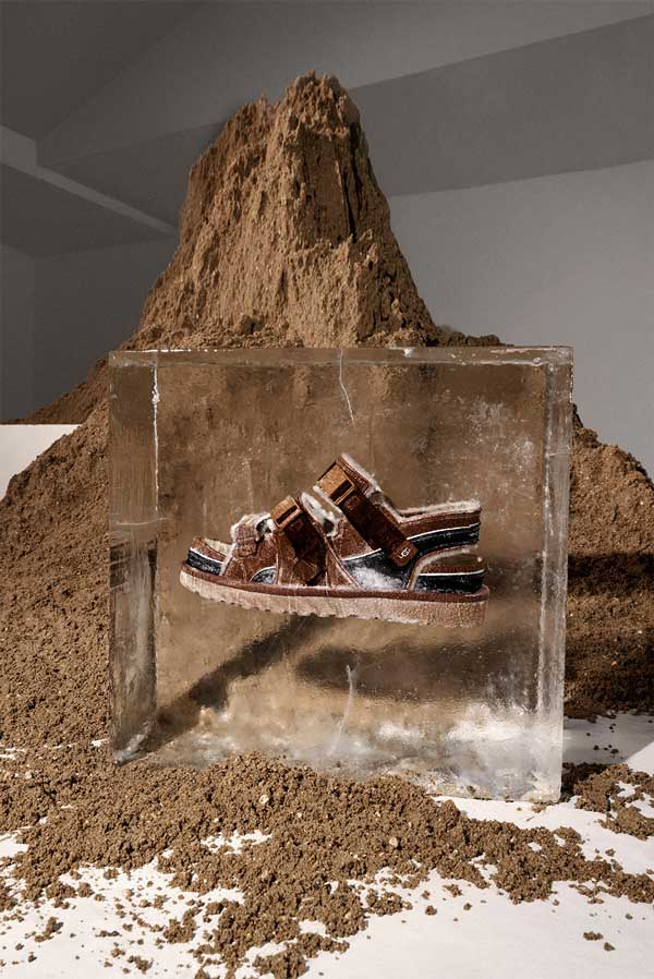 Mound of dirt and block ice featuring UGG boots by Feng Chen Wang.