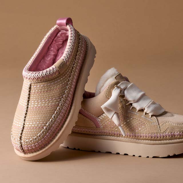 A Women's Lowmel Meadow and Tasman Meadow on display against a tan background.