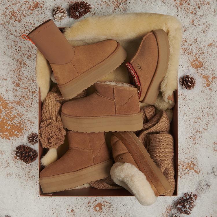 A close up on mix of shoes, all in chesnut - Classic Mini Platform, Tazz, Tazzlita, Classic Ultra Mini Platform and Classic Dipper.